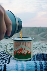 Preview wallpaper tea, cup, camping, thermos, hand