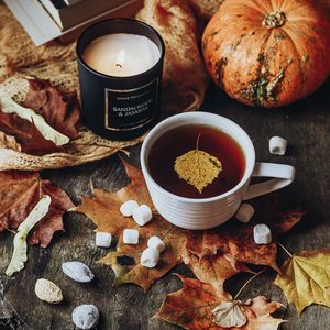 Preview wallpaper tea, cup, candle, autumn, leaves, comfort