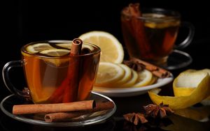 Preview wallpaper tea, cup, cinnamon, lemon, black background