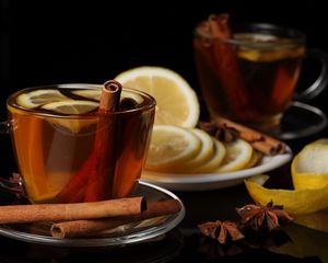 Preview wallpaper tea, cup, cinnamon, lemon, black background