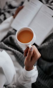 Preview wallpaper tea, cup, hand, book, reading