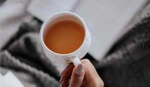 Preview wallpaper tea, cup, hand, book, reading