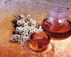 Preview wallpaper tea, drink, cup, decanter, camomile, flowers