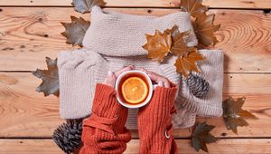 Preview wallpaper tea, lemon, mug, hands, sweater, autumn, cozy