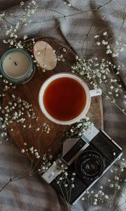 Preview wallpaper tea, mug, camera, candle, flowers, still life