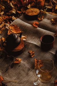 Preview wallpaper teapot, autumn, leaves, cloth