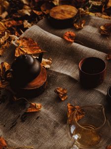 Preview wallpaper teapot, autumn, leaves, cloth