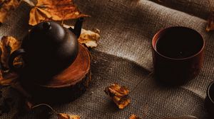 Preview wallpaper teapot, autumn, leaves, cloth