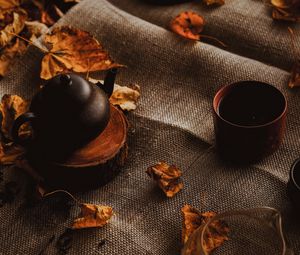 Preview wallpaper teapot, autumn, leaves, cloth