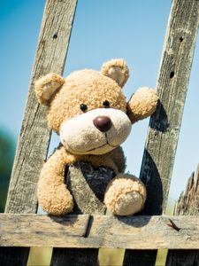 Preview wallpaper teddy bear, fence, toy