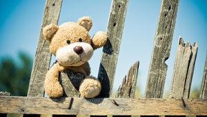 Preview wallpaper teddy bear, fence, toy