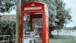 Preview wallpaper telephone booth, books, street