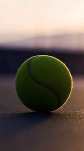 Preview wallpaper tennis ball, asphalt, shadow, sport, bending