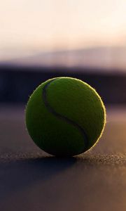 Preview wallpaper tennis ball, asphalt, shadow, sport, bending