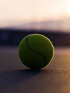 Preview wallpaper tennis ball, asphalt, shadow, sport, bending