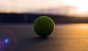 Preview wallpaper tennis ball, asphalt, shadow, sport, bending