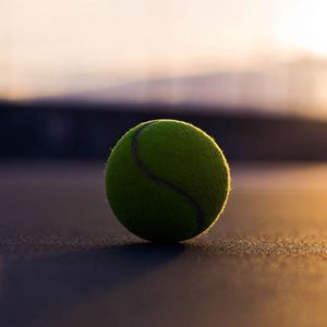 Preview wallpaper tennis ball, asphalt, shadow, sport, bending