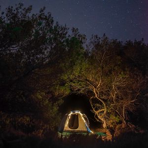 Preview wallpaper tent, camping, night, trees, starry sky