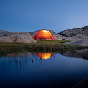 Preview wallpaper tent, camping, stones, pond, reflection, nature