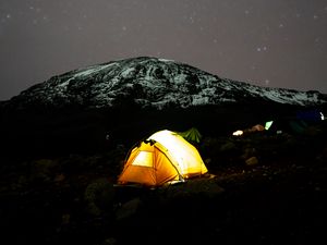 Preview wallpaper tent, glow, mountain, starry sky, dark