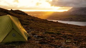 Preview wallpaper tent, hill, river, clouds, nature