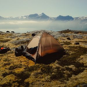 Preview wallpaper tent, mountains, fog, camping