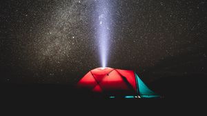 Preview wallpaper tent, night, starry sky, light, beam, camping