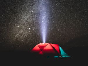 Preview wallpaper tent, night, starry sky, light, beam, camping