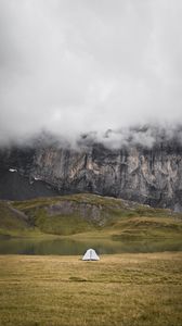 Preview wallpaper tent, rocks, mountains, fog, grass