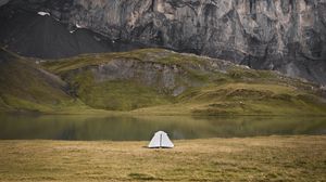 Preview wallpaper tent, rocks, mountains, fog, grass