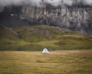 Preview wallpaper tent, rocks, mountains, fog, grass