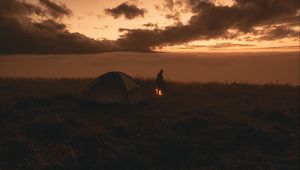 Preview wallpaper tent, silhouette, campfire, dark, twilight