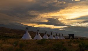 Preview wallpaper tents, grass, dawn, clouds