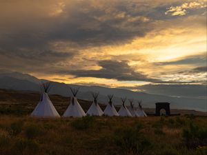 Preview wallpaper tents, grass, dawn, clouds