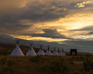 Preview wallpaper tents, grass, dawn, clouds