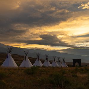 Preview wallpaper tents, grass, dawn, clouds