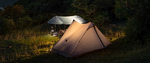 Preview wallpaper tents, hills, mountains, night, dark