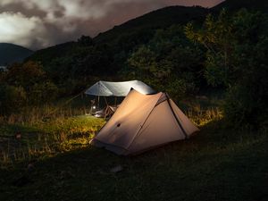 Preview wallpaper tents, hills, mountains, night, dark