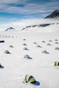 Preview wallpaper tents, snow, plain, winter, mountains, white