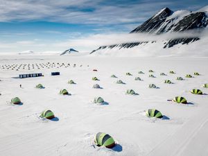 Preview wallpaper tents, snow, plain, winter, mountains, white