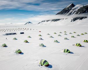 Preview wallpaper tents, snow, plain, winter, mountains, white