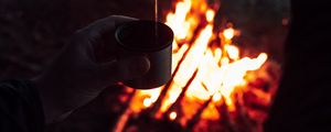 Preview wallpaper thermos, tea, bonfire, dark