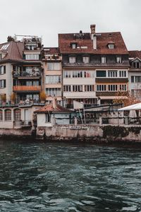 Preview wallpaper thun, switzerland, building, river, shore