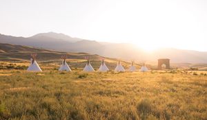 Preview wallpaper tipi, grass, sunshine, mountains