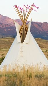 Preview wallpaper tipi, grass, valley, mountains