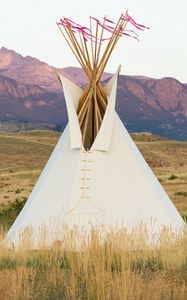 Preview wallpaper tipi, grass, valley, mountains