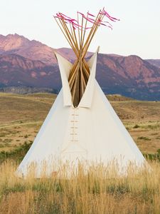 Preview wallpaper tipi, grass, valley, mountains