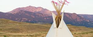 Preview wallpaper tipi, grass, valley, mountains