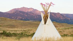 Preview wallpaper tipi, grass, valley, mountains