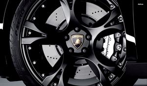 Preview wallpaper tire, rim, black, sports car, lamborghini, emblem